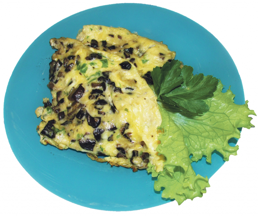 Sātīga omlete ar meža sēnēm.